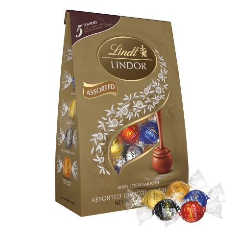 Lindt - Enjoy a variety of festive pralines in milk, white, and