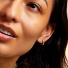 Pure Collection by Ross-Simons 0.15 ct. t.w. Diamond Bezel Huggie Hoop Earrings in 14kt Yellow Gold - 3 of 4
