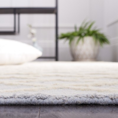 Light Blue and Ivory Hand-Tufted Wool 4' x 6' Area Rug