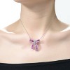 Guili Rhodium-Plated Sterling Silver Bowtie Pendant Necklace with Sparkling CZ in Purple or Blue—A Chic and Sophisticated Touch for Any Outfit. - 3 of 3