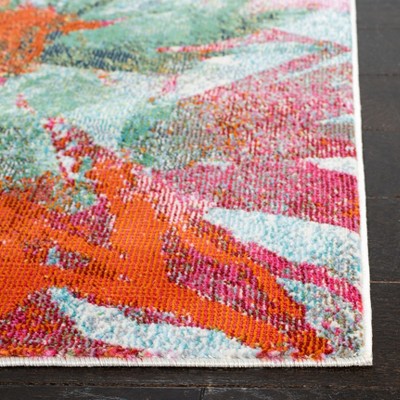 Lillian Blue and Orange Floral Synthetic Area Rug