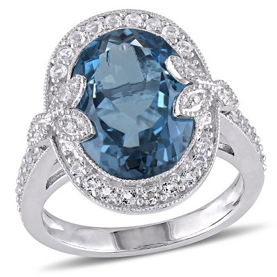 EVERLY JEWELRY | Sterling Silver 7.9 CT TGW Oval Cut Blue and White Topaz and Accent Diamond Halo Trillium Cocktail Ring