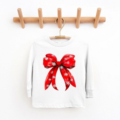 The Juniper Shop Coquette Christmas Snowflake Bow Toddler Long Sleeve Tee
