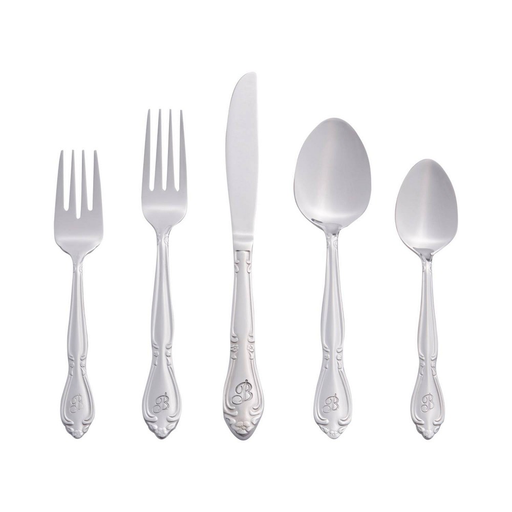 RiverRidge 46pc Personalized Rose Pattern Silverware Set B Impress family and dinner guests with this RiverRidge 46pc Monogram Rose Silverware Set A-Z. Each piece is permanently stamped with the letter of your choice. The heavy gauge stainless steel flatware has a polished mirror finish and is durable for daily use. Its traditional shape and flower blossom design will coordinate with any table setting. These pieces make a great gift for weddings or holidays. Color: One Color.