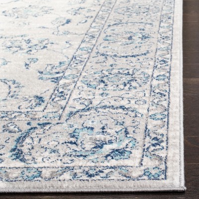 Brentwood 5'3" x 7'6" Blue Synthetic Stain-Resistant Area Rug