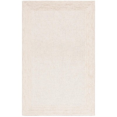 Ebony EBN425 Handmade Tufted Rug - Safavieh