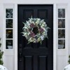 Winter Wreath Front Door 24 Inch Snow Covered Artificial Door Wreath with Purple Peonies Green Leaves Pine Cones and Berries - 3 of 4