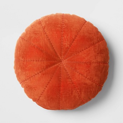 Orange round shops pillow