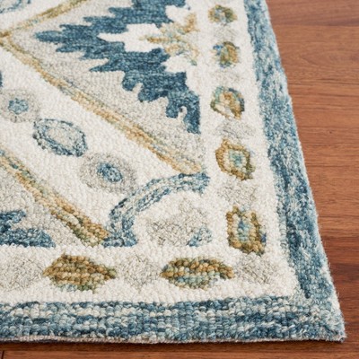 Ivory and Blue Hand Tufted Wool Rectangular Rug