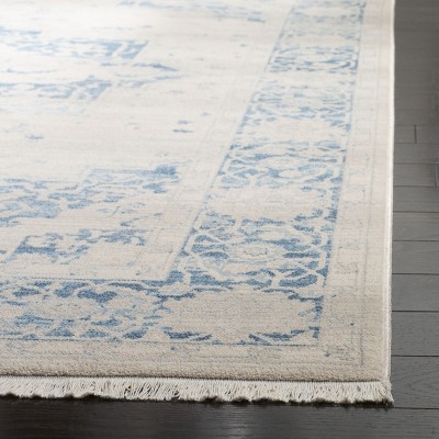 Ivory and Blue Hand-Knotted Synthetic 4' x 6' Area Rug
