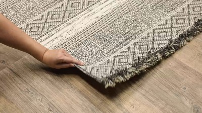 Gillian Beige and Black Synthetic Flatwoven Area Rug 5'3" x 7'3"