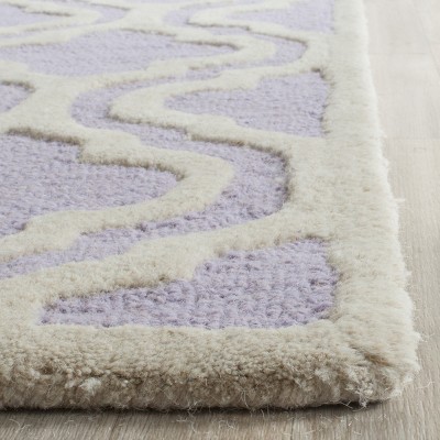 Ivory Elegance 9' x 12' Hand-Tufted Wool Area Rug