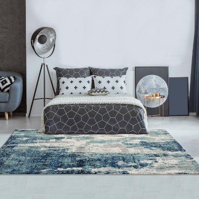 Light Blue Abstract 5' x 7' Stain-Resistant Area Rug