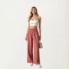 Anna-Kaci Women's Textured Knit Pants with Wide Leg Silhouette and Stretch Waistband Featuring Decorative Button Front Detail - 2 of 4