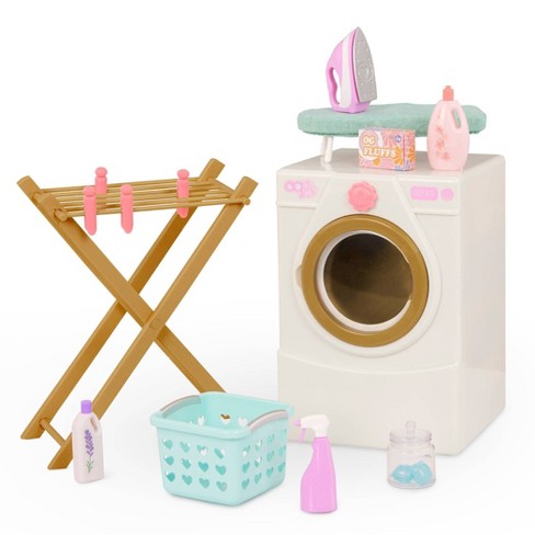 Homemade Barbie doll house spinning washer and dryer.