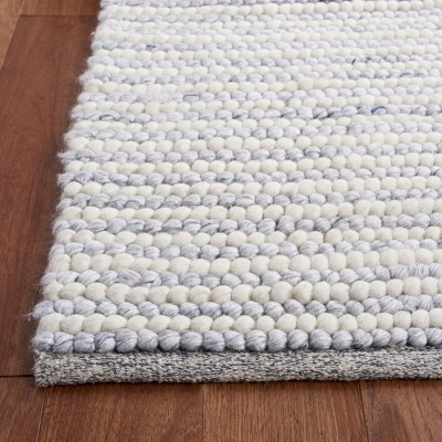 Handmade Ivory and Blue Wool Rectangular Area Rug 4' x 6'