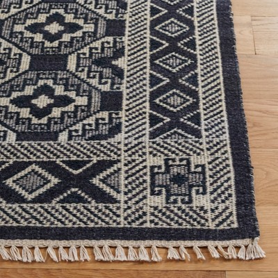 Handmade Black and Ivory Wool Flat Weave Area Rug, 4' x 6'