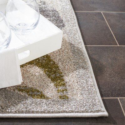 Ivory and Light Grey Floral Scroll Synthetic Area Rug