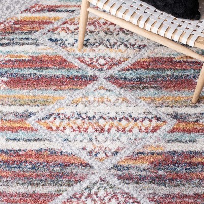 Ivory and Rust 8' x 10' Rectangular Synthetic Stain-Resistant Area Rug