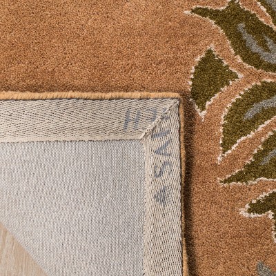 Handmade Floral Elegance Round Blue Wool Rug, 47 in