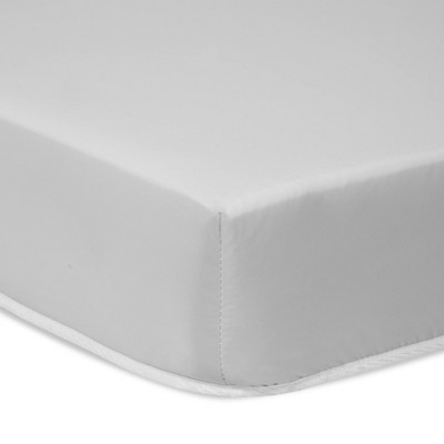 firm mini crib mattress