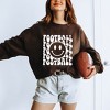 Simply Sage Market Women's Graphic Sweatshirt Football Smiley Face - 2 of 4