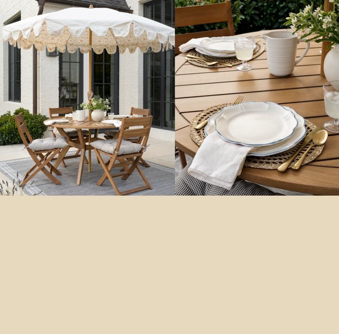 Outdoor dining set under floral scalloped umbrella. Set outdoor table with seagrass placemats, gold stainless steel flatware and white dishes.