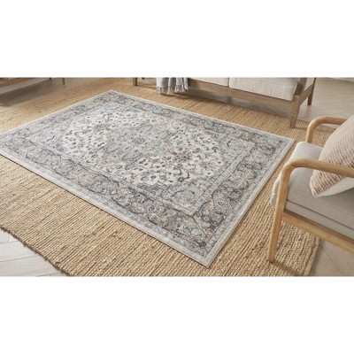 Ivory and Grey Synthetic 5' x 7' Reversible Area Rug