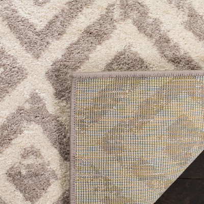 Elegant Ivory Synthetic 54" Round Hand-Knotted Area Rug