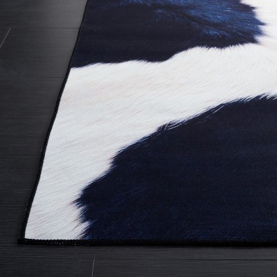 Ivory and Dark Blue Faux Cowhide Fur 5' x 8' Area Rug