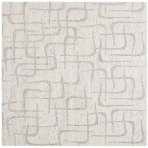 Ebony EBN903 Hand Tufted Indoor Rugs - Safavieh - 1 of 4