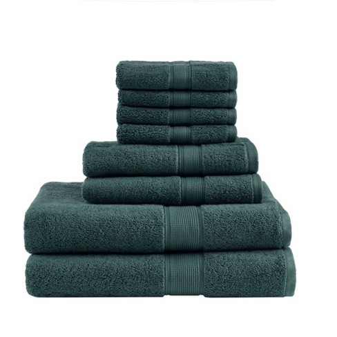 dark green towels and bathmats