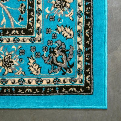 Turquoise and Ivory Synthetic 4' x 6' Easy-Care Rectangular Rug