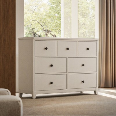 This storage cabinet measures 44.88 inches in size, comes with seven drawers, and is off-white in color