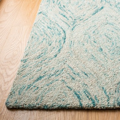 Ivory and Sea Blue Hand-Tufted Wool 6' x 9' Area Rug