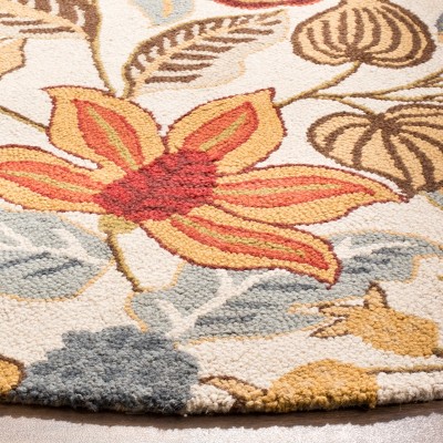 Handmade Ivory and Multicolor Floral Wool Round Area Rug, 6'