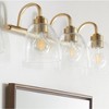 Quorum Lighting Reyes 3 - Light Vanity in  Aged Brass - 3 of 4