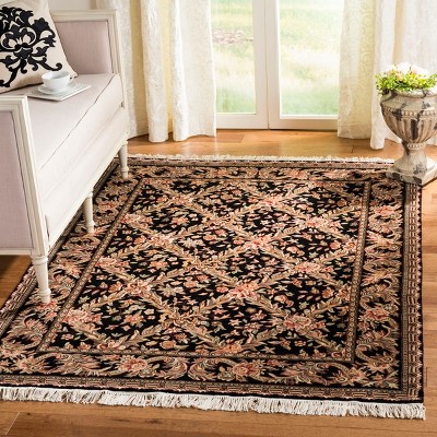 Elegant Kerman Black Wool 5' x 7' Hand-Knotted Area Rug