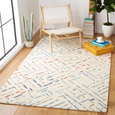 Ivory and Blue Hand-Tufted Wool 6' x 9' Area Rug