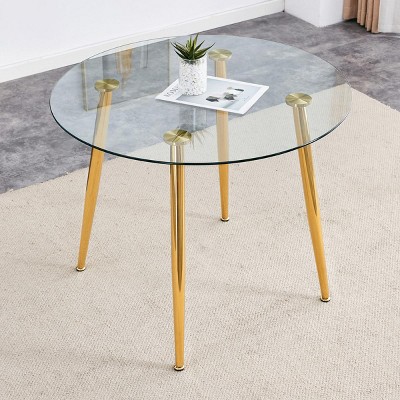 Lovmor Round dining table with glass top, silver metal legs,the silver legs show an extraordinary texture