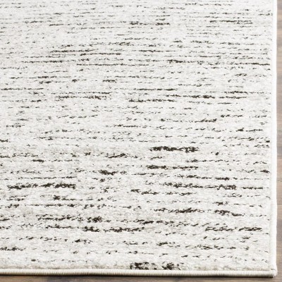 Ivory and Silver Synthetic Rectangle Area Rug, 10' x 14'