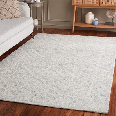 Ivory Hand Tufted Wool 4' x 6' Area Rug