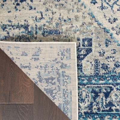 Ivory and Light Blue Synthetic 6' x 9' Easy Care Rug