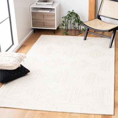 Ivory Geometric Handmade Wool Round Tufted Rug