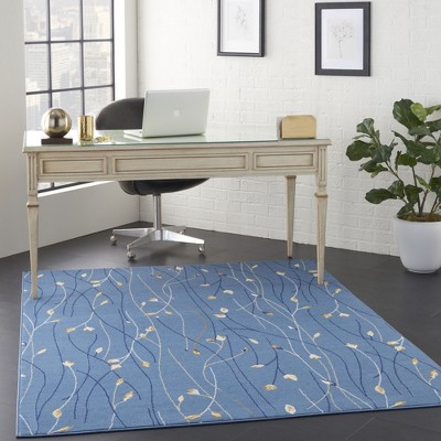 Light Blue Floral Synthetic 5' x 7' Area Rug