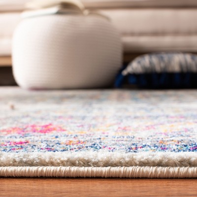 8' x 10' Cream and Fuchsia Synthetic Reversible Area Rug