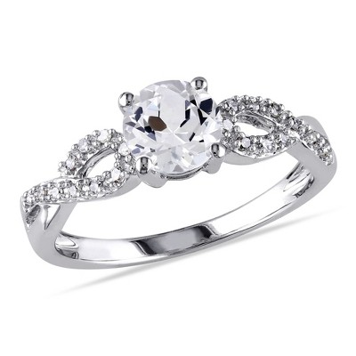 EVERLY JEWELRY | 10K White Gold 1/10 CT Diamond TW And 1 CT TGW Created White Sapphire Infinity Ring