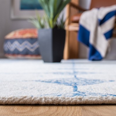 Ivory and Blue Handmade Abstract Wool Rug, 4' x 6'