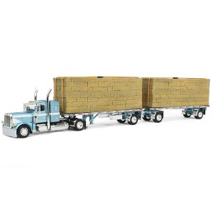First Gear DCP 1/64 Blue Peterbilt 389 36in Flattop w/ Dual Flatbeds & Hay Load 60-1831 - 1 of 4