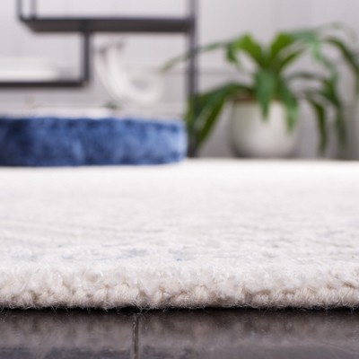 Ivory and Blue Wool 4' x 6' Handmade Geometric Rug